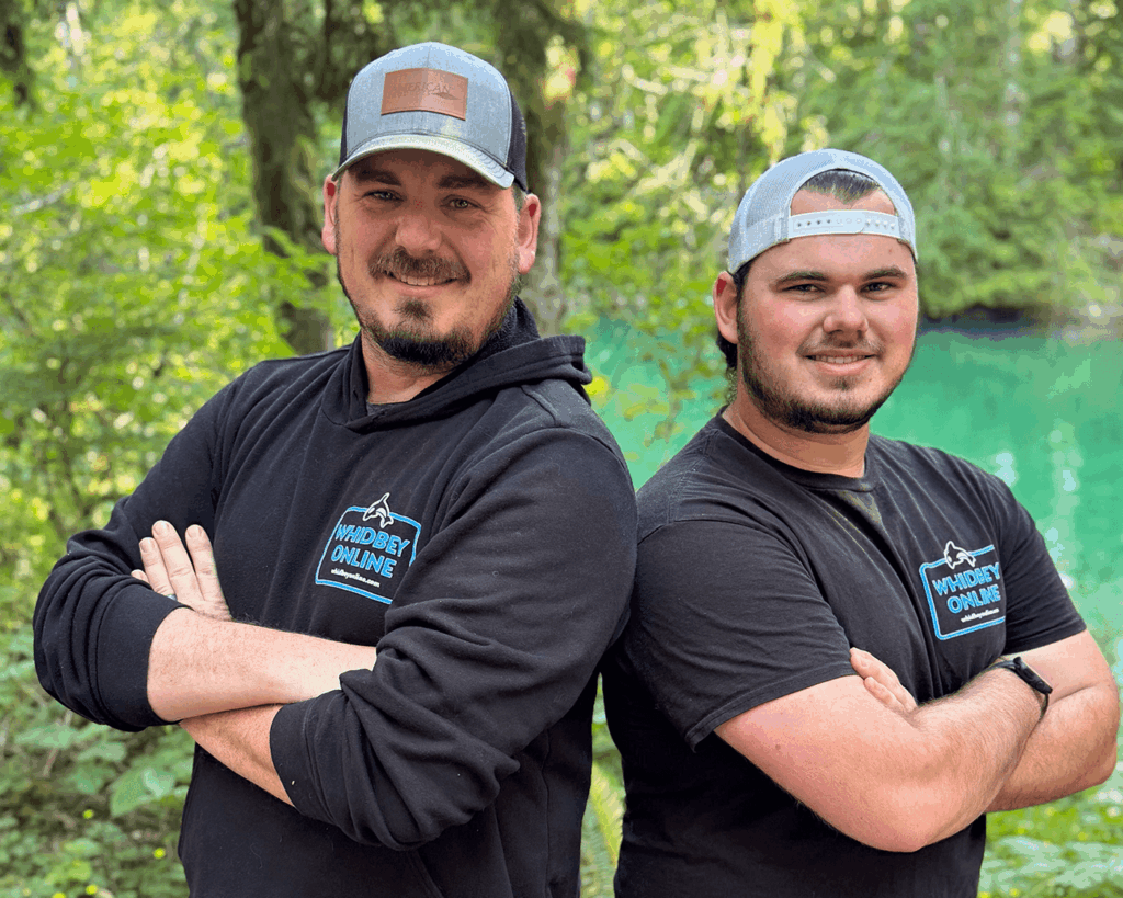 Two Whidbey Online staff members smiling for a photograph